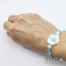 Bracciale cordino cerato con fiore bianco e azzurro