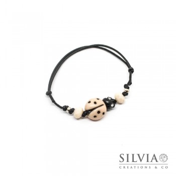 Bracciale cordino cerato con coccinella rosa cipria e nera