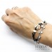 Bracciale cordino cerato con coccinella rosa cipria e nera