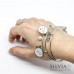 Bracciale bangle in acciaio con frase "La musica nel cuore"