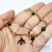 Bracciale con ciondolo rondine nera stelle e cristalli