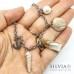 Bracciale catena con charms conchiglie e "message in a bottle"