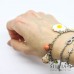 Bracciale primaverile catena acciaio con coniglio pulcino e margherita