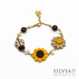 Bracciale con girasole, coccinella e margherita