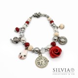 Bracciale a tema Alice con perle cristalli e charms