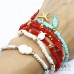 Bracciale elastico con corallini o cristalli colorati da 4mm e ciondolo