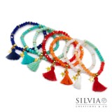 Bracciale elastico con cristalli colorati da 6mm e nappina Bracciale elastico con cristalli colorati da 6mm e nappina