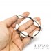 Bracciale elastico nero con conchiglie e charms in acciaio a tema mare