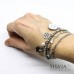 Bracciale elastico con perle acciaio pinguino e fiocco di neve