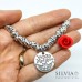 Bracciale a tema Alice con nodini intrecciati in alluminio e charms
