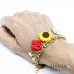 Bracciale con catena acciaio color oro e charms ispirati al Mago di Oz