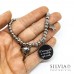 Bracciale elastico perle acciaio e frase tratta dal Piccolo Principe su sfondo nero