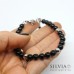 Bracciale uomo con perle di onice da 6 mm e chiusura a moschettone