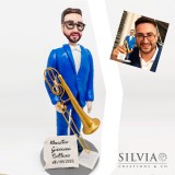 Cake topper per la laurea di un musicista con trombone