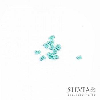 Fettine in pasta polimerica a forma di farfalla azzurra 3x4 mm x 100pz