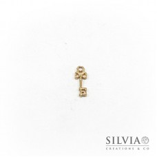 Charm a forma di chiave oro in zama 20x8 mm