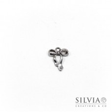 Charm a forma di fiocco argento antico in zama 22x18 mm