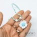 Collana cordino cerato con fiore bianco e azzurro