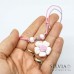 Collana cordino cerato con fiore bianco e rosa