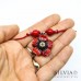 Collana cordino cerato con fiore rosso 