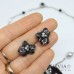 Collana girocollo e orecchini a lobo con orchidea nera e argento
