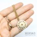 Collana girocollo e medaglietta con costellazioni astronomiche in acciaio dorato