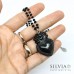 Collana girocollo cristalli con sacro cuore ex voto nero