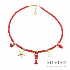 Collana girocollo cristallini rossi con pesce e charms mare oro e rossi
