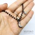 Collana girocollo catena acciaio con cristalli neri luna bombata e cristallino