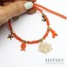 Collana girocollo cristallini arancio rametto di corallo oro e charms mare