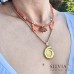 Collana girocollo cristallini arancio rametto di corallo oro e charms mare