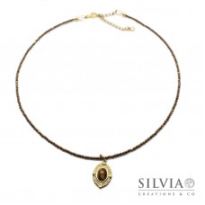 Collana girocollo cristallini sfaccettati marroni e ovale con occhio di tigre Collana girocollo cristallini sfaccettati marroni e ovale con occhio di tigre