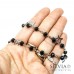 Collana girocollo stile rosario con cristalli neri e ciondoli a tema mare