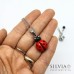 Collana girocollo con catenina in acciaio e coccinella rossa