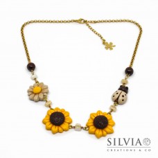Collana girocollo con girasole, coccinella e margherita
