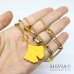Collana lunga catena in acciaio color oro con foglia di ginkgo biloba