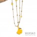 Collana lunga catena in acciaio color oro con foglia di ginkgo biloba