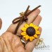 Collana lunga con fiocco e girasole