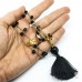 Collana filo oro ad uncinetto con cristalli neri e charms