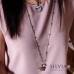 Collana lunga in acciaio con stella e pietra di quarzo rosa