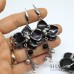 Orecchini pendenti e spilla con orchidea nera e argento