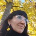 Orecchini pendenti in acciaio color oro con foglia di ginkgo biloba