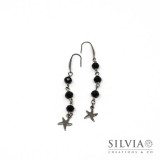 Orecchini pendenti stile rosario con cristalli neri e stella marina