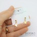 Orecchini a perno in acciaio color oro con ciondolo stella marina mini