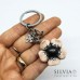 Portachiavi fiore anemone rosa cipria e nero con charms
