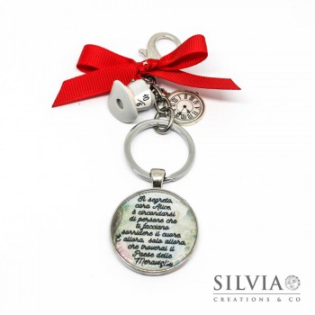 Portachiavi a tema Alice con frase e charms