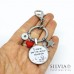 Portachiavi con scritta "Tu sarai per me unico al mondo" e charms